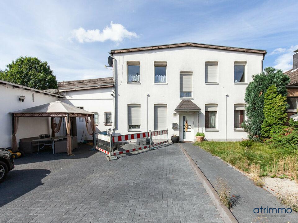 Vermietetes MFH mit vier Wohnungen, Büroeinheit, Dachterrasse und Garagen in Solingen Nordrhein-Westfalen