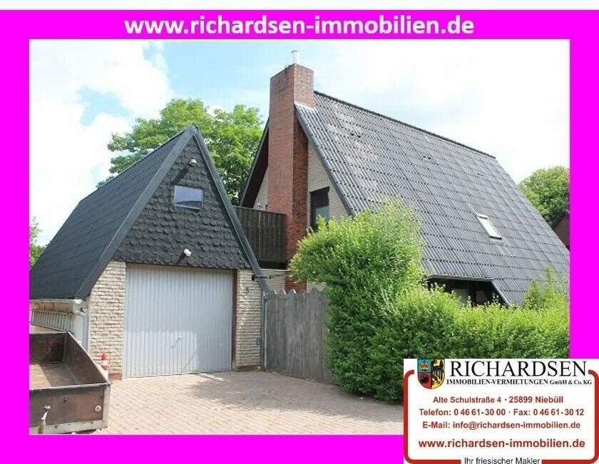 Einfamilienhaus mit hervorstechender Architektur nebst Garagengebäude in 25899 Niebüll Niebüll