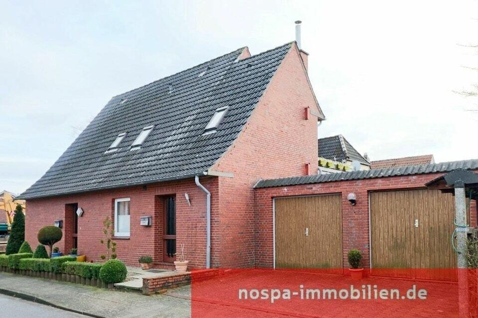 Ihre Kapitalanlage in Husum: Vermietetes Einfamilienhaus mit Garagen in der Kreisstadt! Husum
