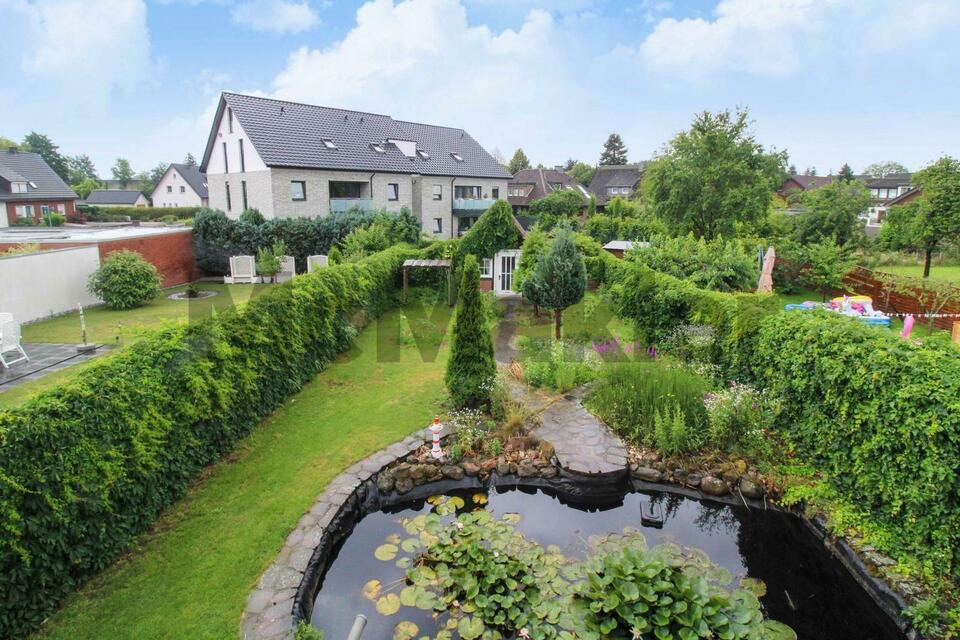 Familienidyll: DHH mit großer Raumvielfalt, traumhaftem Garten mit Teich, Terrasse und Balkon Rheda-Wiedenbrück