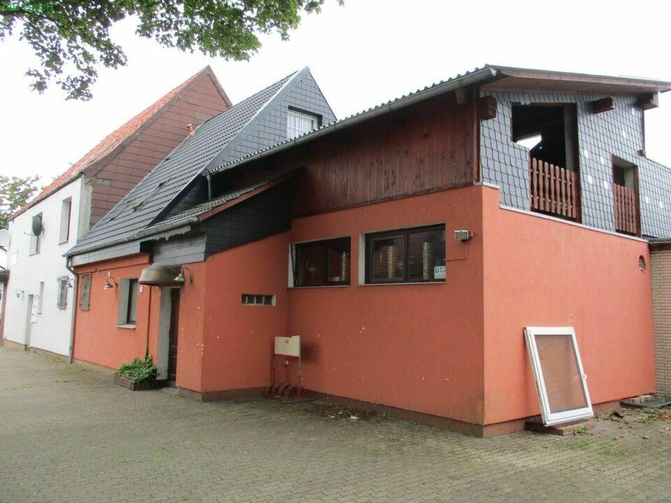 Zentral gelegenes Mehrfamilienhaus mit 4 + 2 Einheiten Heide