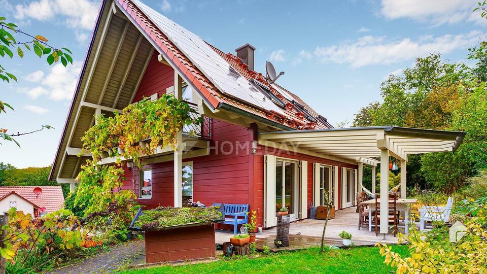 Hoch ökologisches Holzhaus mit Solarthermieanlage und großem Grundstück mit Terrasse Leidersbach