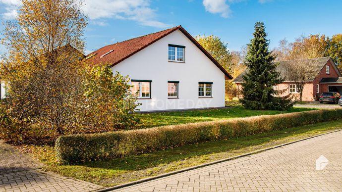 Großzügiges Einfamilienhaus mit Anbau, Garten und Garagen in Osterholz-Scharmbeck Osterholz-Scharmbeck