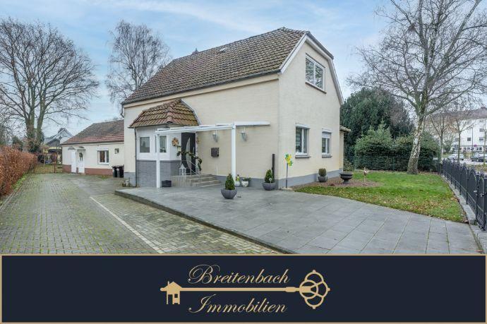 Bremen - Kirchhuchting Großzügiges Zweifamilienhaus mit Garten und Baugrundstück Bremen