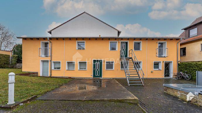 Voll vermietetes Mehrfamilienhaus mit 4 Wohneinheiten und Stellplätzen in Niederwerrn Bergen auf Rügen