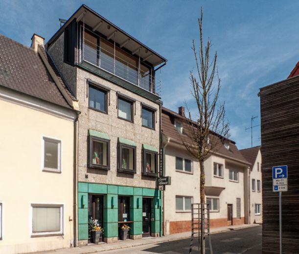 Großes Entwicklungspotential: Stadthaus mit Gastronomie, Wohnraum, Balkon und Terrasse! Bergen auf Rügen