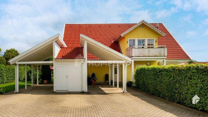 Attraktives Zweifamilienhaus mit 2 WE, Balkon, Terrasse und Carportanlage in Gachenbach Bergen auf Rügen