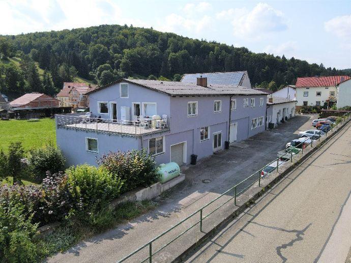 Wohn- und Geschäftshaus mit KFZ-Stellplätzen und Photovoltaikanlage -reserviert- Auf dem Mühlenfeld