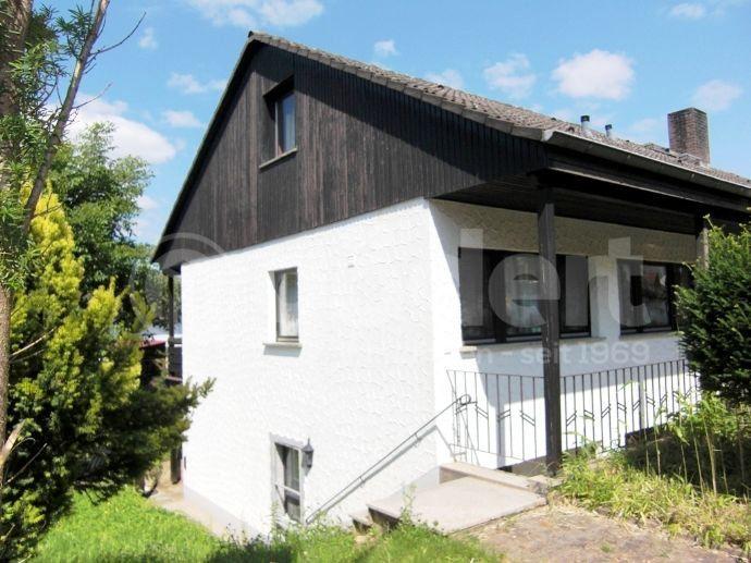 Einfamilienhaus mit Einliegerwohnung und Garage Auf dem Mühlenfeld