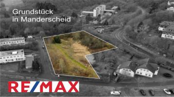 REMAX - Manderscheid Am Tannenhain offeriert Bauland und Grünfläche mit freien Blick nach Süden