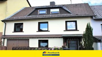 Postbank Immobilien präsentiert:kleines Einfamilienhaus mit großem Garten