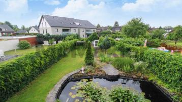 Familienidyll: DHH mit großer Raumvielfalt, traumhaftem Garten mit Teich, Terrasse und Balkon