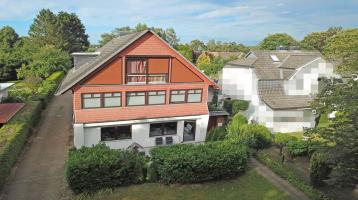 Bargteheide: Vollvermietetes Mehrfamilienhaus in Toplage mit großem Grundstück, Garagen, Stellplätzen unweit des Stadtkerns
