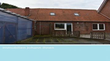 Landhaus mit Scheune, Nebenscheune und Garage/Carport in Wittmund-Rispelerhelmt