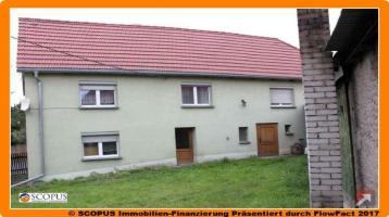 Sanierungsbedürftiges Einfamilienhaus mit Scheune und Nebengebäude in Niederau