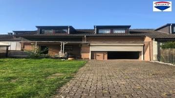 Zweifamilienhaus mit 2 Wohnungen, einer Garage und großem Garten in Bielefeld Senne zu verkaufen!