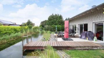 Gehobener Wohntraum im Grünen: Energieeffizientes EFH mit schönem Garten und Schwimmteich