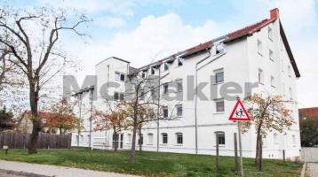 Kapitalanlage vor den Toren Leipzigs: Vermietete 1-Zimmer-Wohnung mit Balkon in grüner Lage